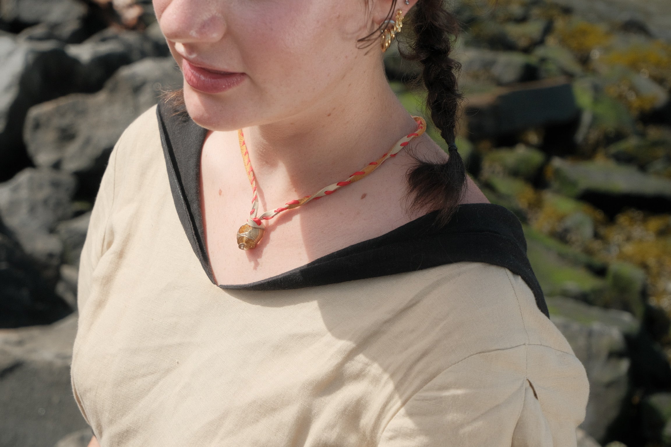 Whorl pendant & suede + silk whipstitch cord