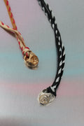 Whorl pendant & suede + silk whipstitch cord